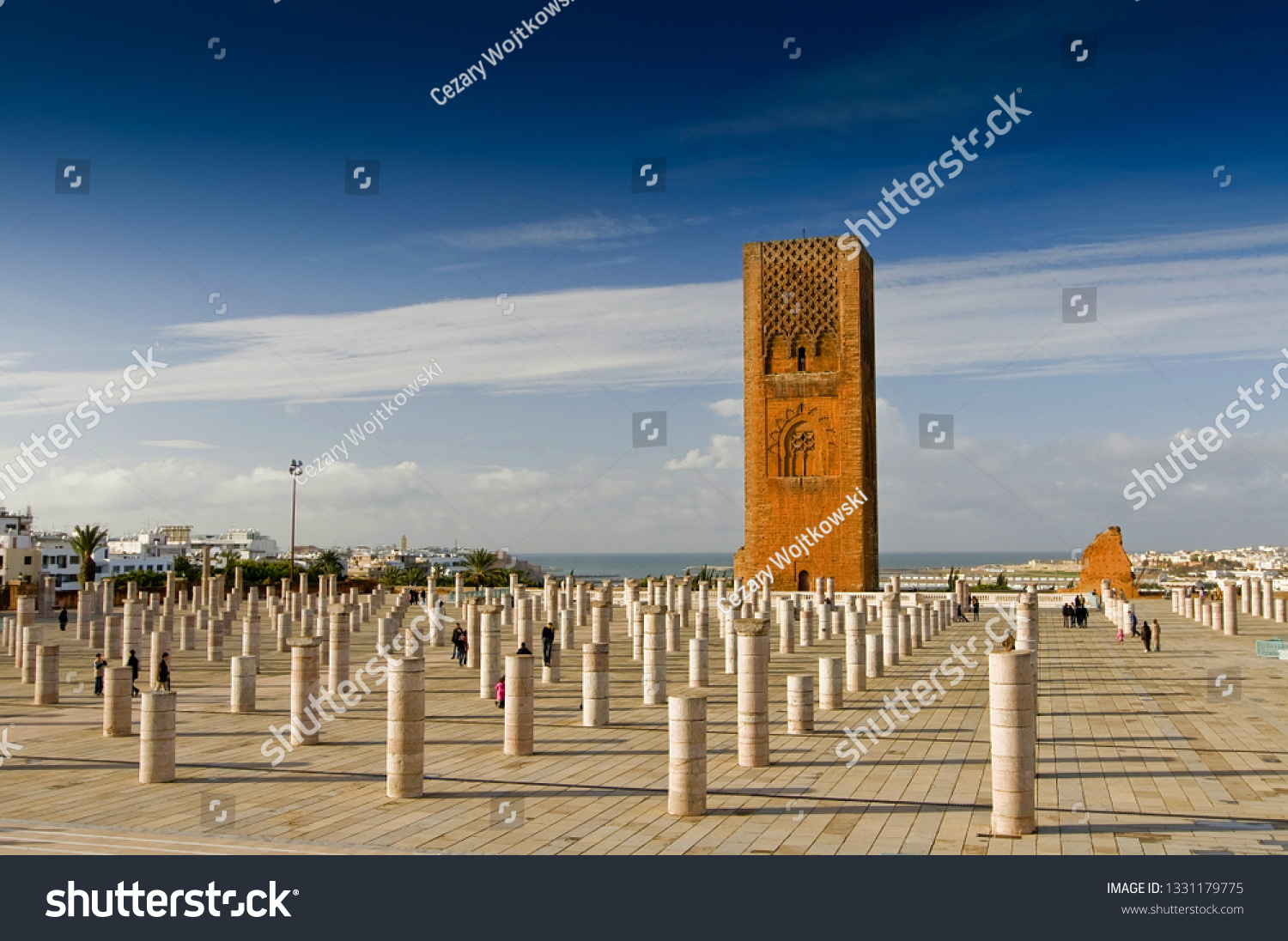 Tour Hassan tower in the square with stone columns. Made of red sandstone important historical and tourist complex in Rabat Morocco.
