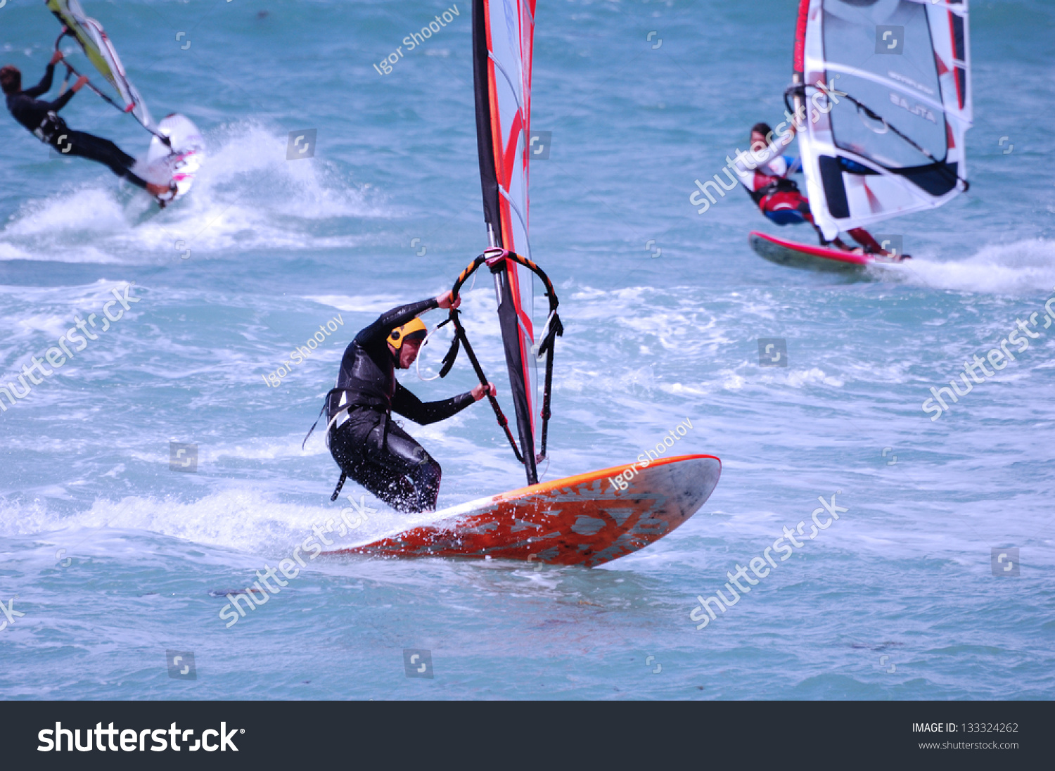 Windsurfing on a beach of Mediterranean sea
