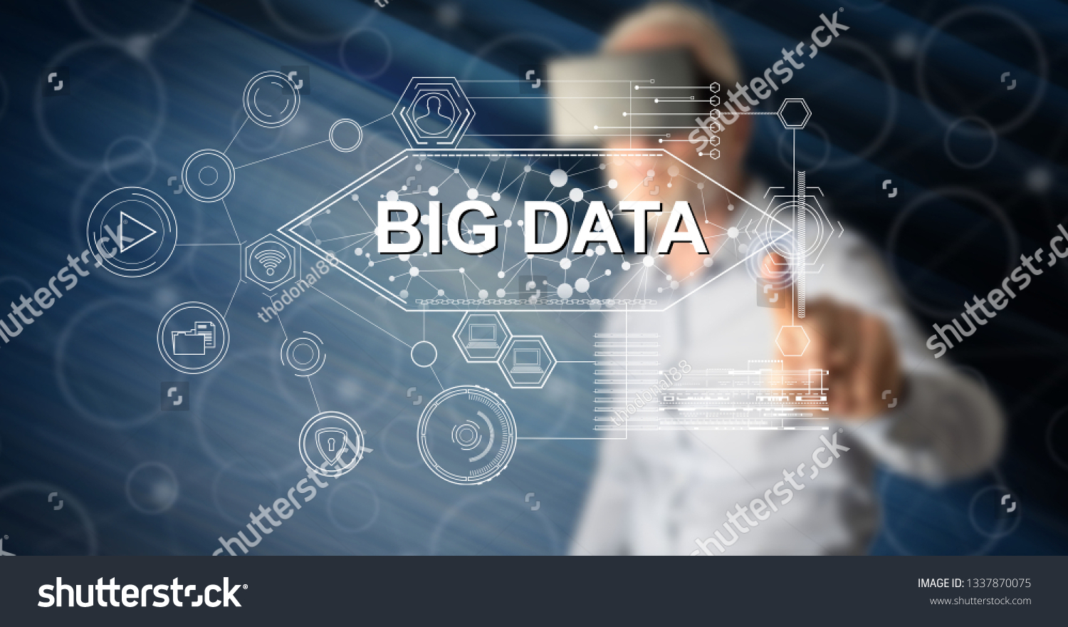 Man with vr headset touching a big data concept on a touch screen with his finger