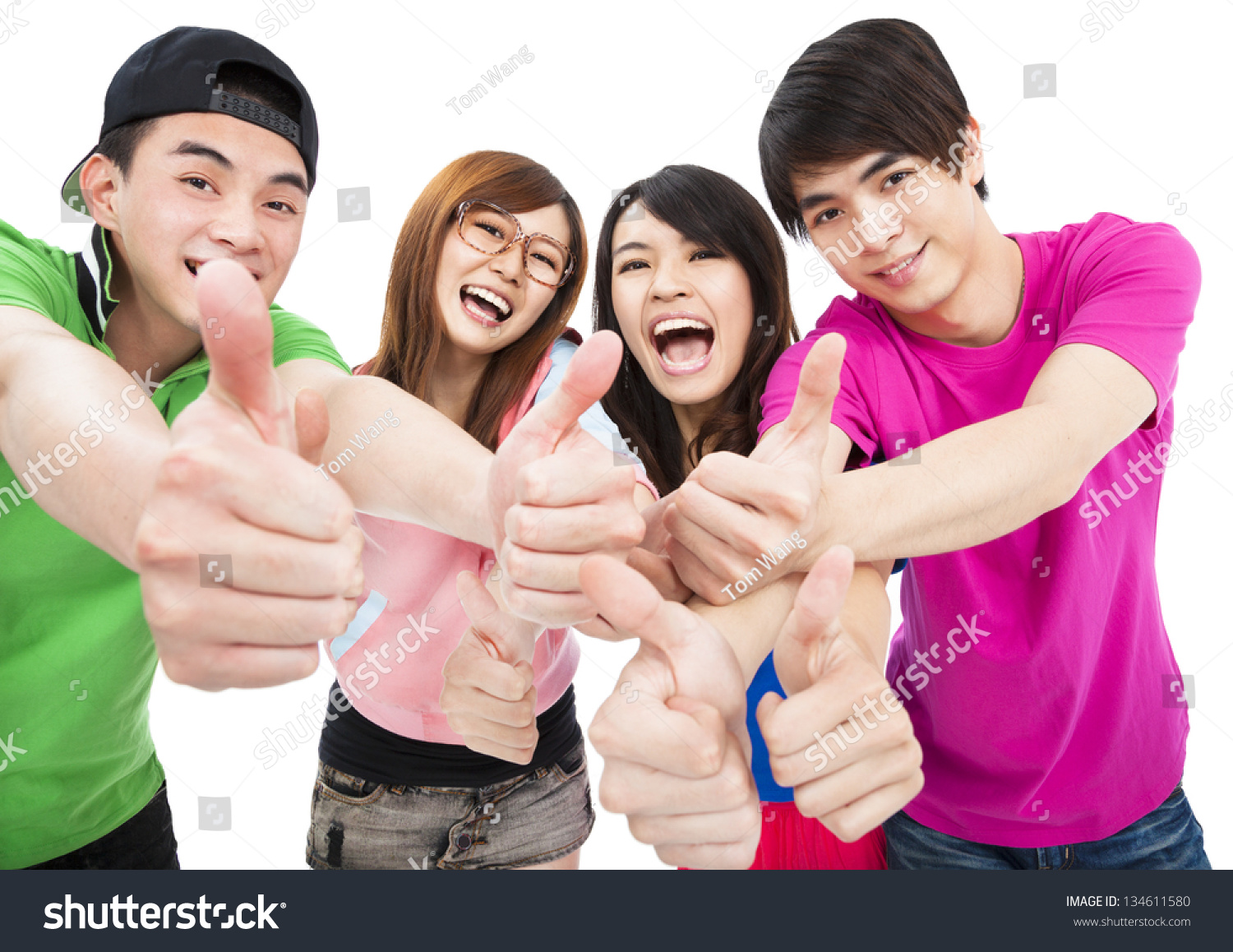 happy  young group with thumbs up