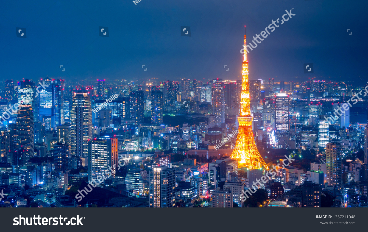 Aerial view over Tokyo tower and Tokyo cityscape view from Roppongi Hills at night in Tokyo Japan