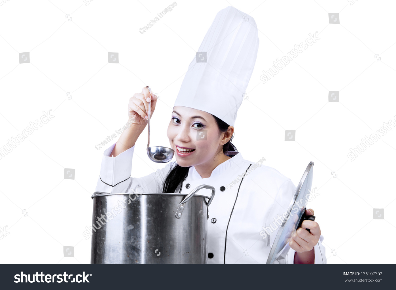 Asian chef is tasting a traditional soup isolated on white background