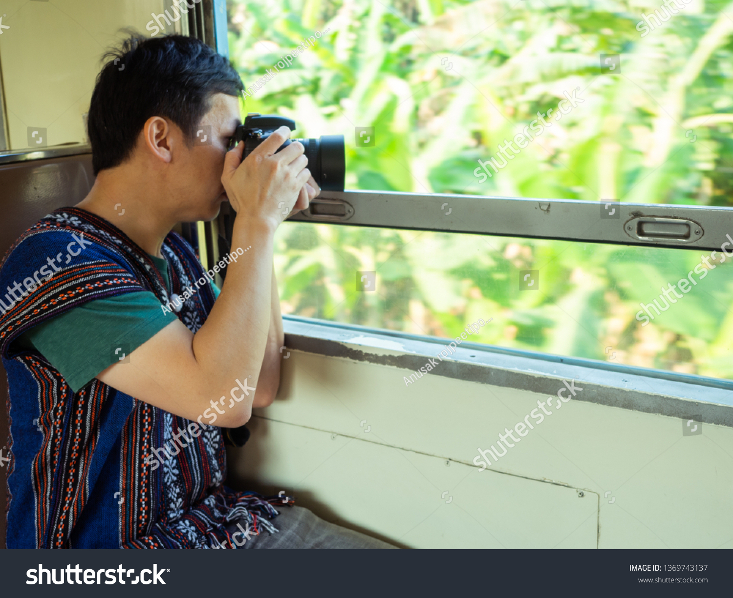 travel concept.happy asian people traveling by train. asia take photo in train
