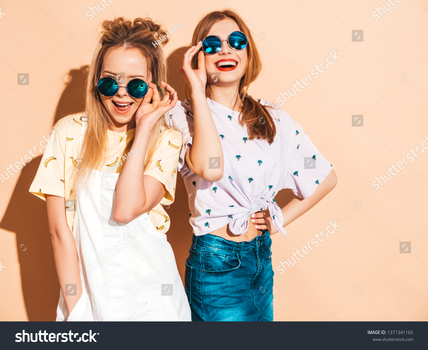 Two Young Beautiful Smiling Blond Hipster Girls In Trendy Summer Colorful T Shirt Clothes Sexy