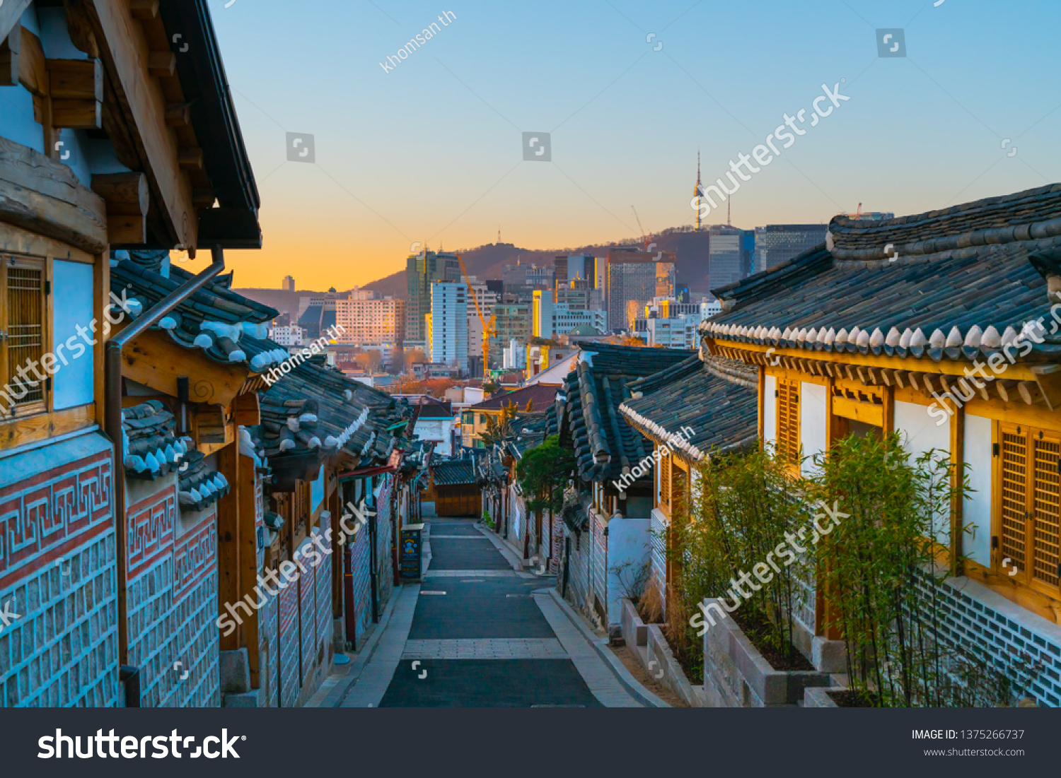 Korean traditional house. Namsangol Hanok Village and Seoul Tower background  Seoul  South Korea.