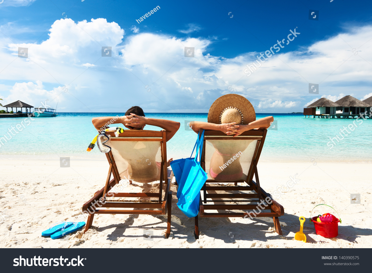 Couple on a tropical beach at Maldives