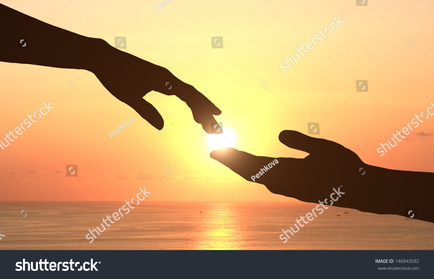 two hands holding puzzle