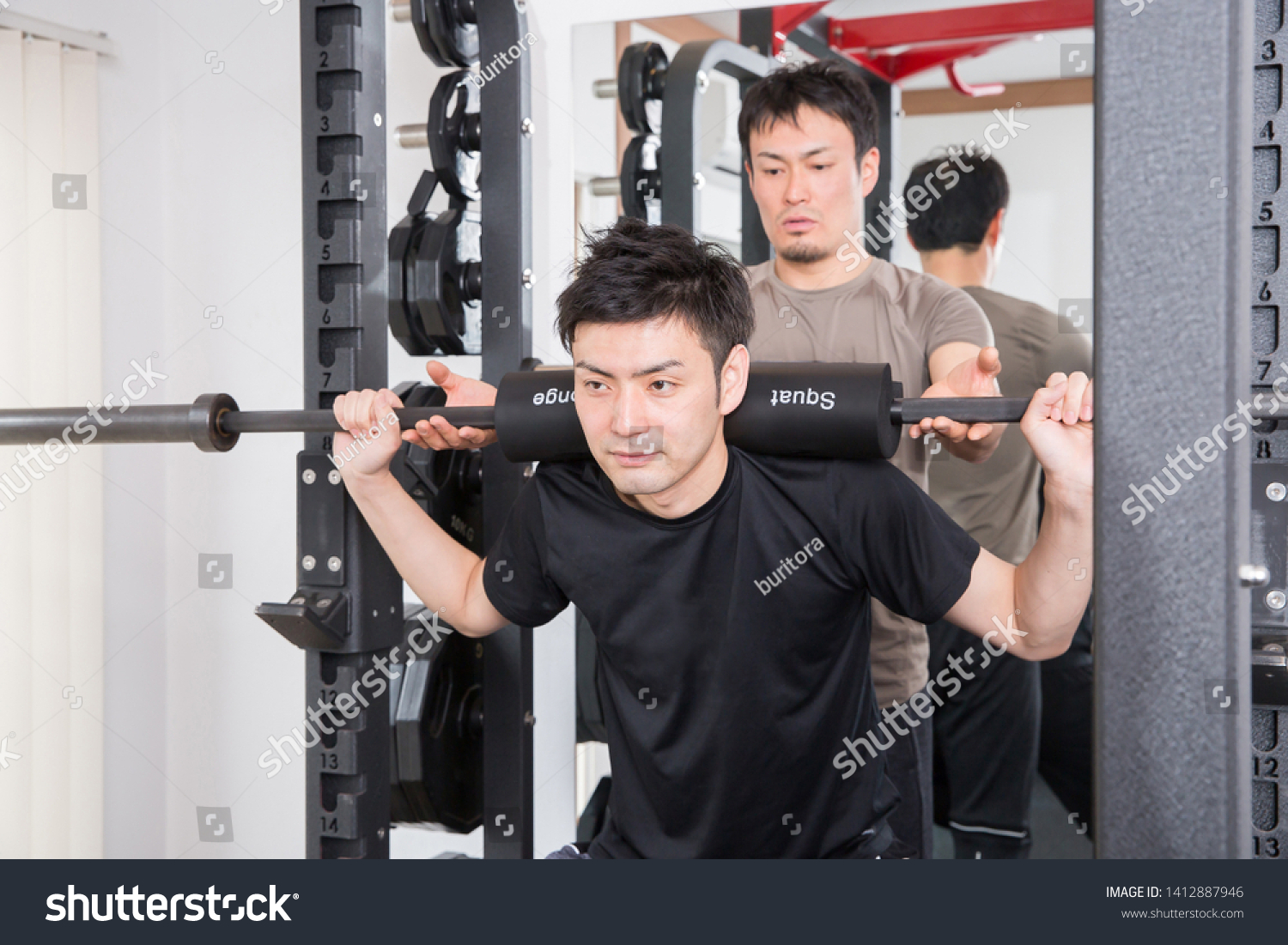 People who strengthen a body by sports gym