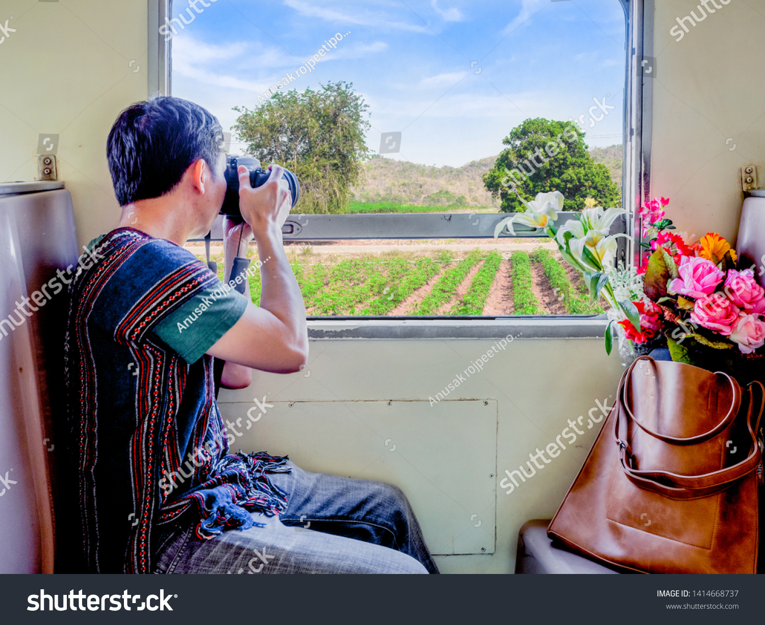 travel concept.traveller take photo from train window traveling trip sightseeing