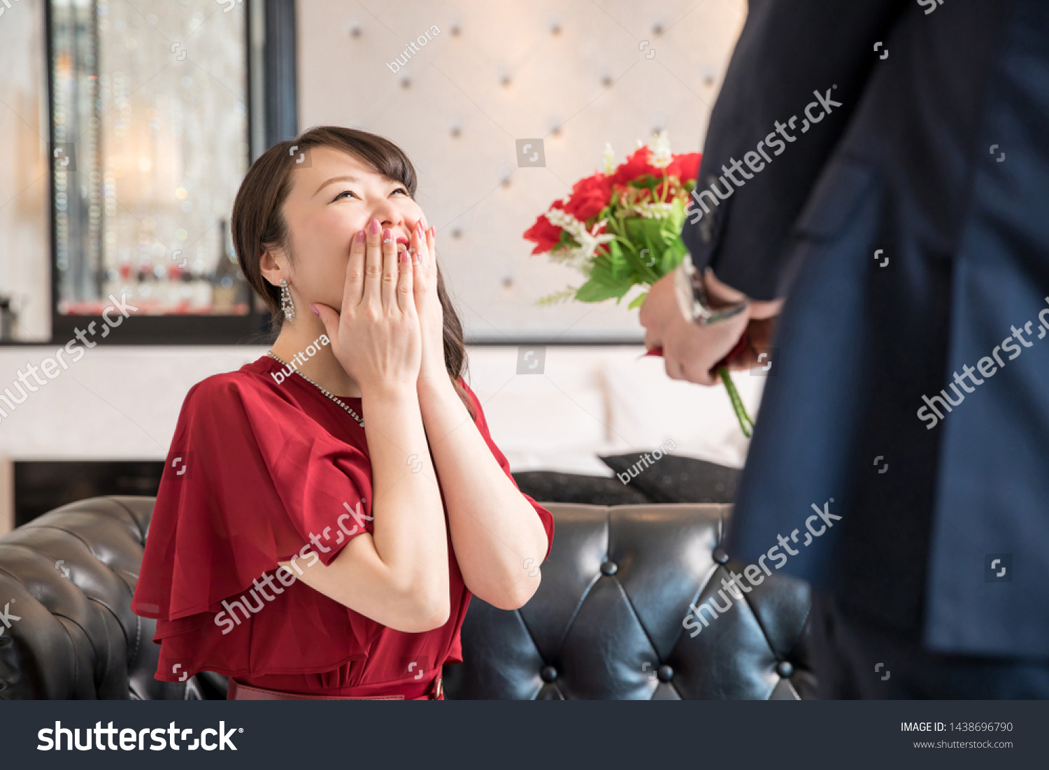 The woman who is proposed to in a luxurious hotel