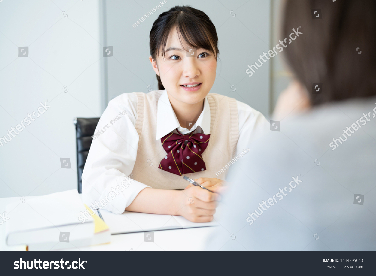 Education concept of an asian high school girl. Cram school. Private teacher.