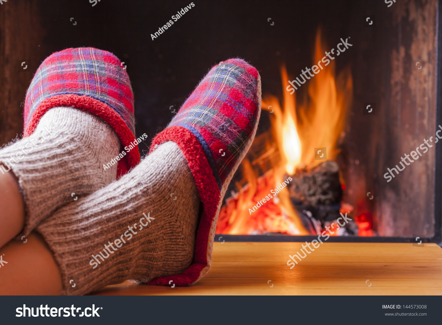 relaxing at the fireplace on winter evening