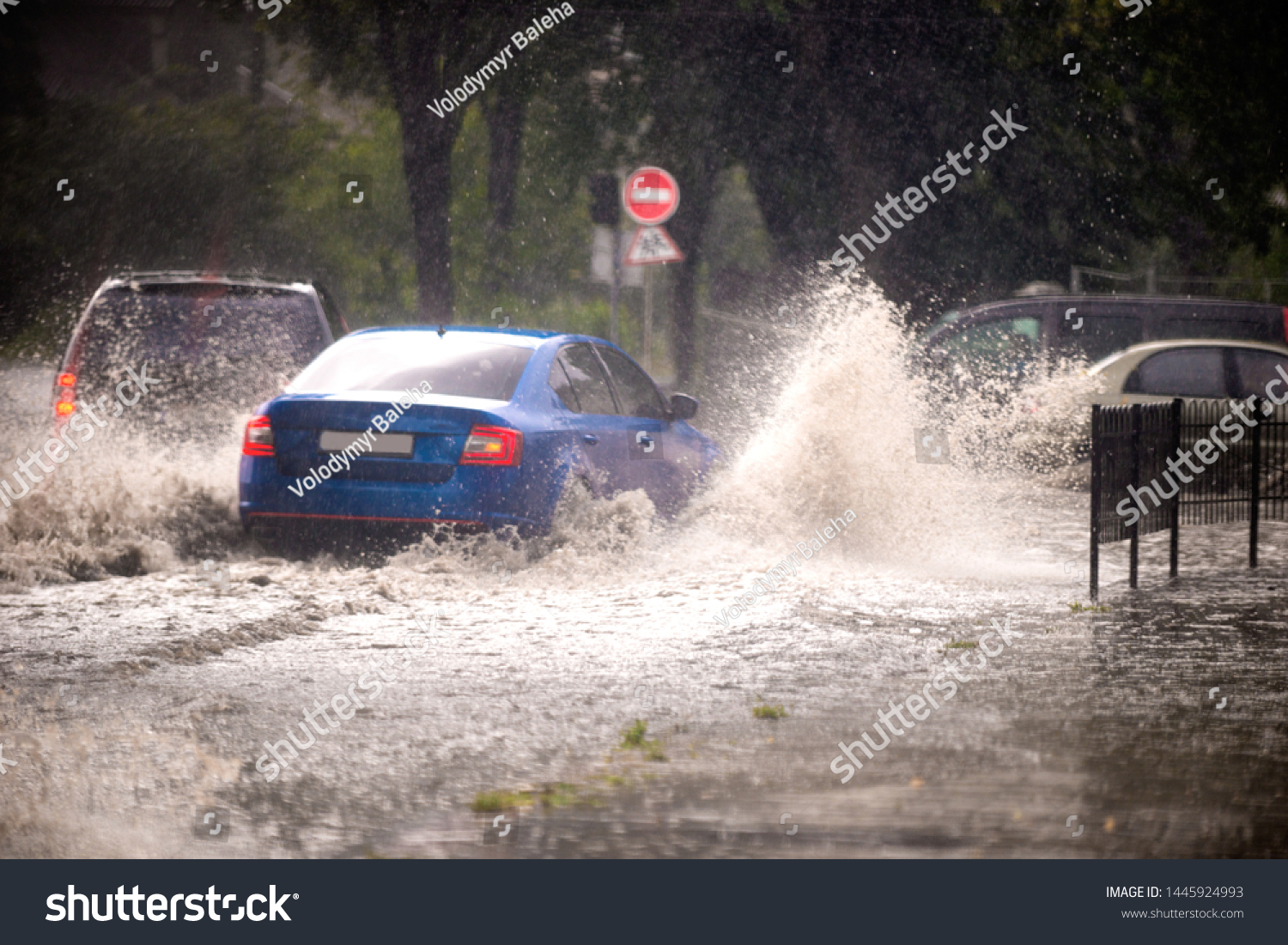 Strong rain in the city. Street of the city flooded after heavy rains