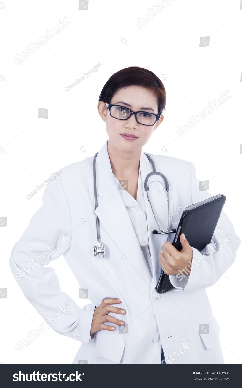 Confident female doctor and touchpad on white background