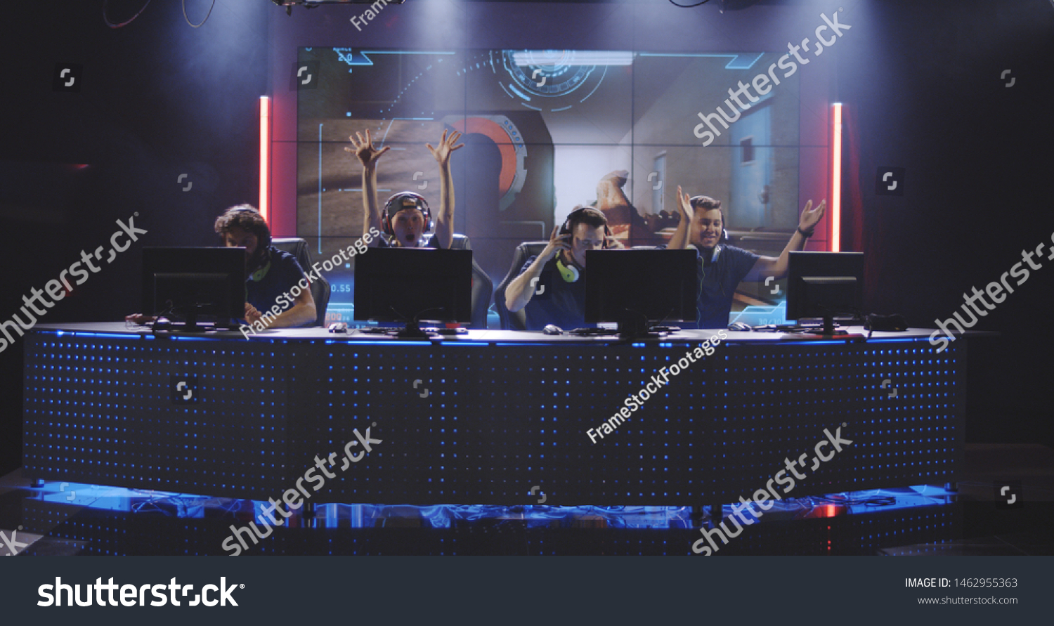 Full shot of a team winning a match at a gaming tournament