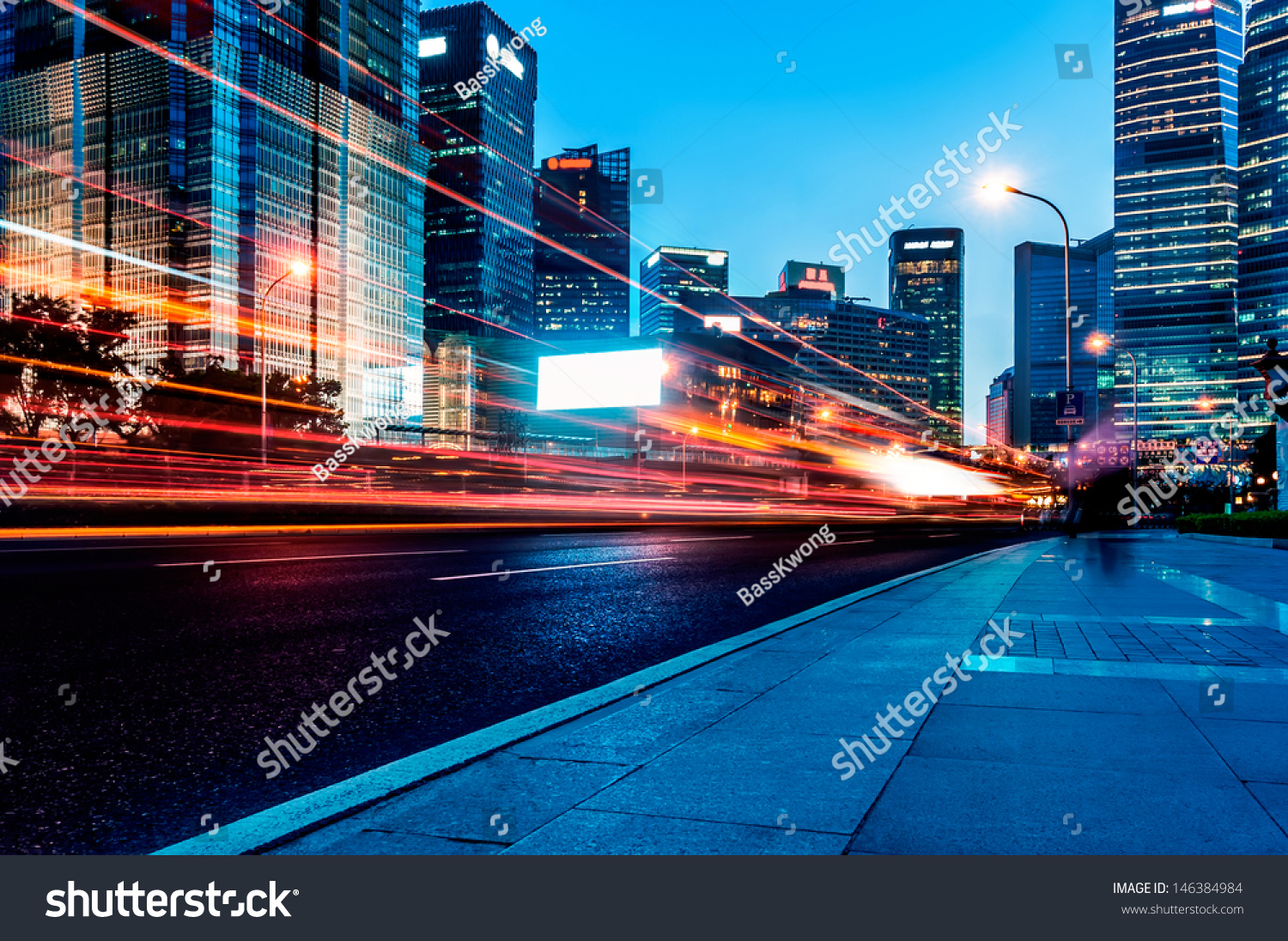 The light trails on the modern building background in shanghai china.