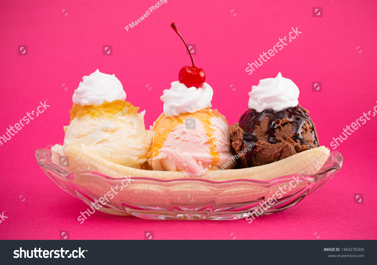 A Classic Banana Split on a Bright Pink Background