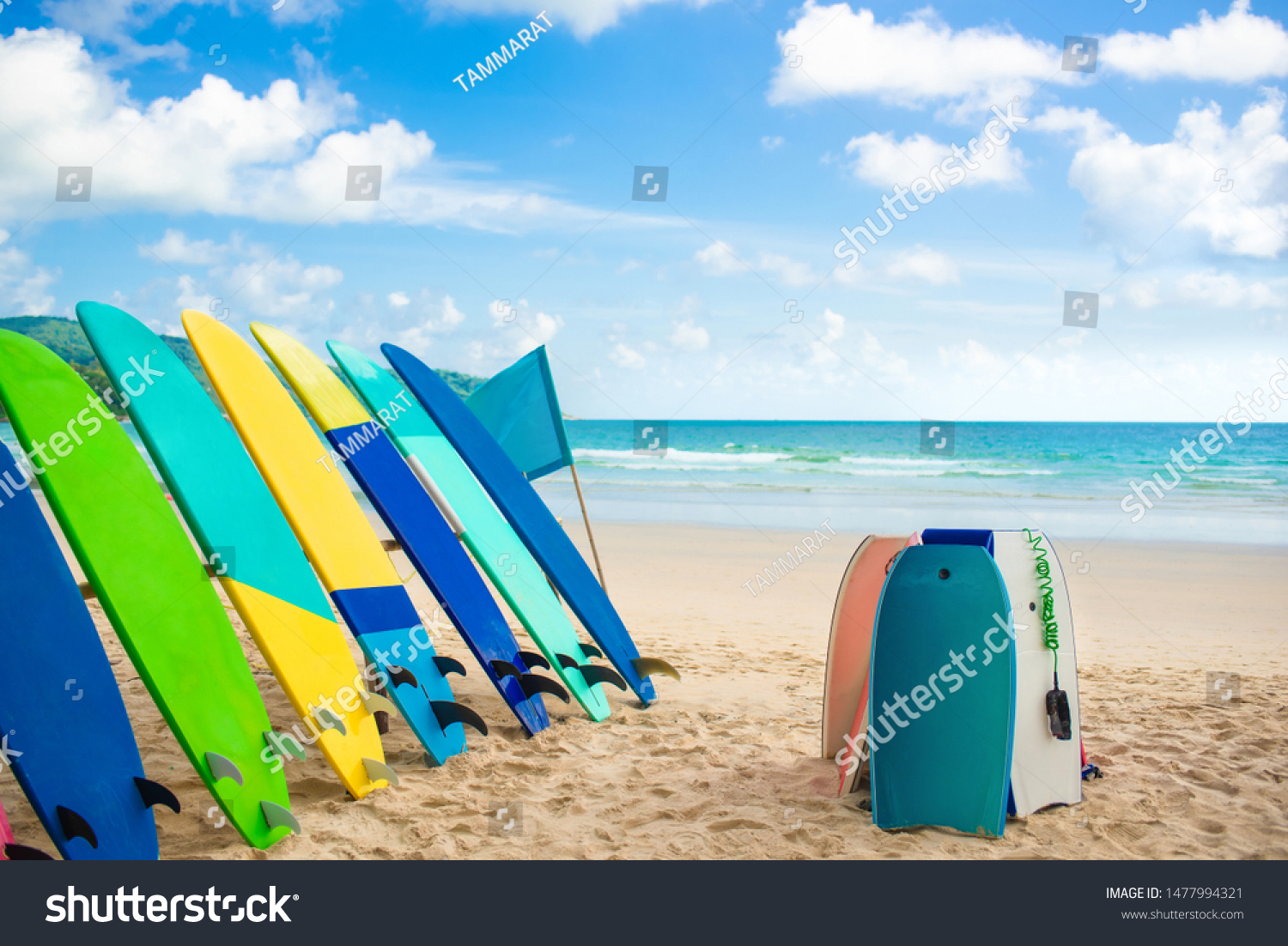 Colorful surfboards on tropical beach at Phuket Thailand and bule sky