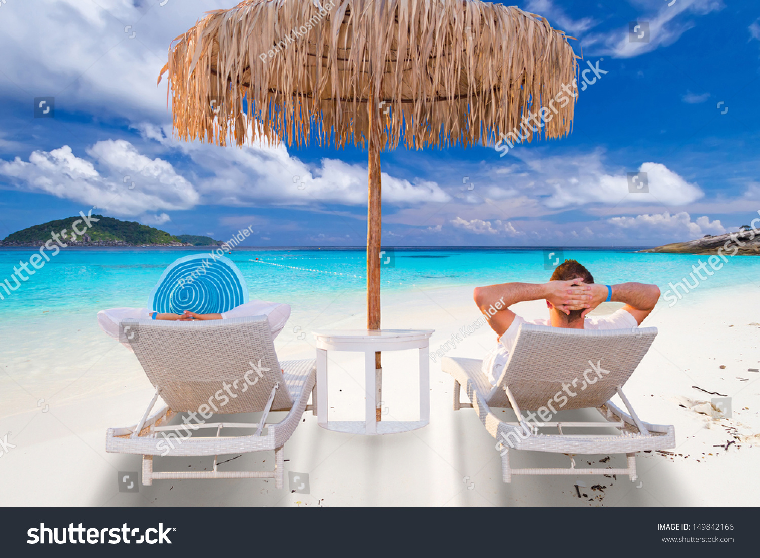 Couple on tropical holidays at the sea
