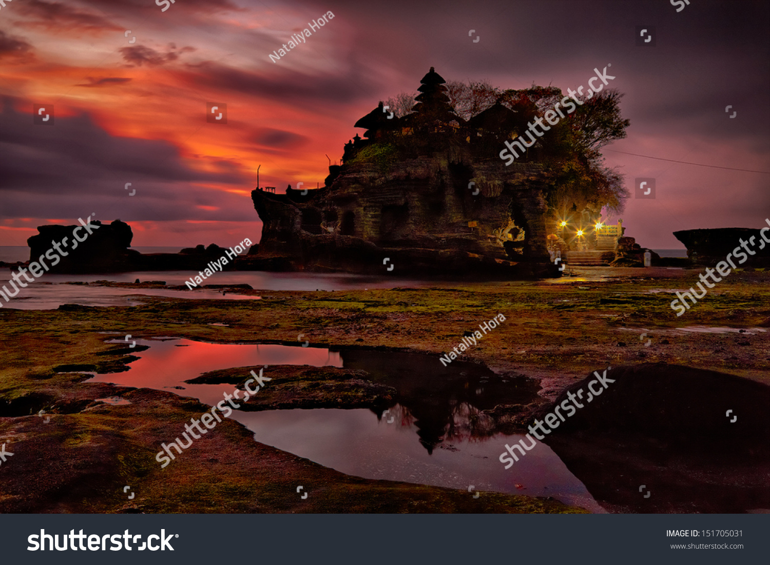 sunset over hindu temple Pura Tanah Lot  Bali  Indonesia