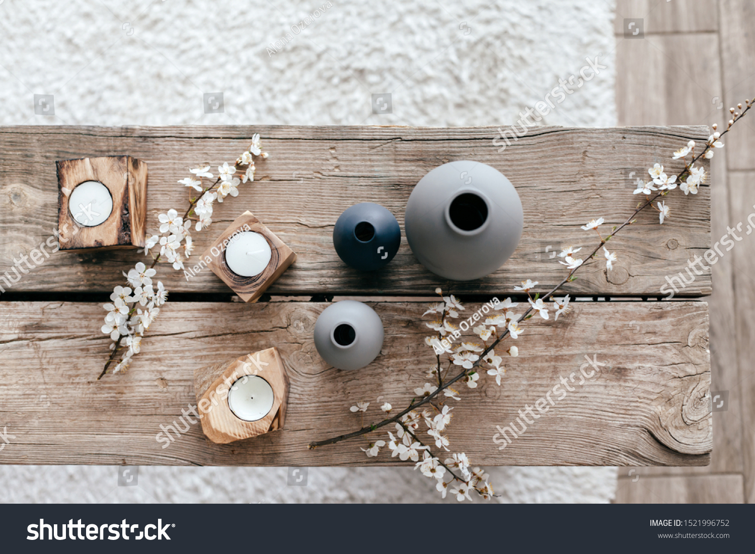 Spring home decor on reclaimed rustic bench  top view of scandinavian interior details.