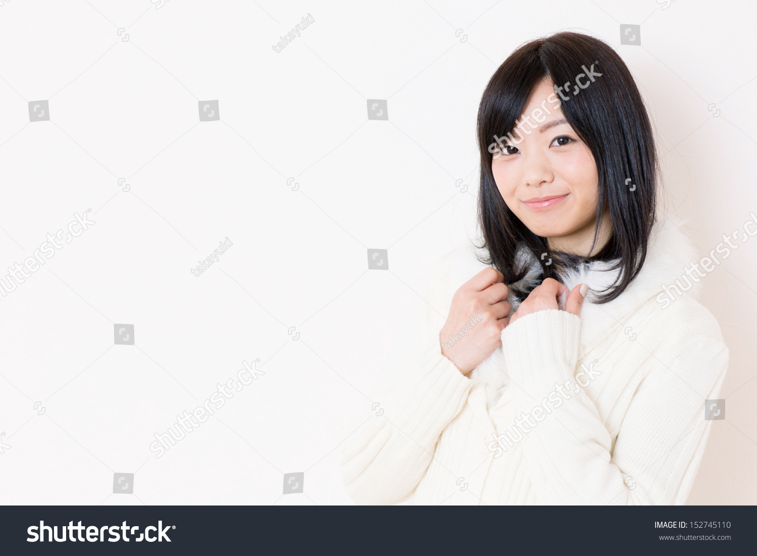 young beautiful asian woman on white background