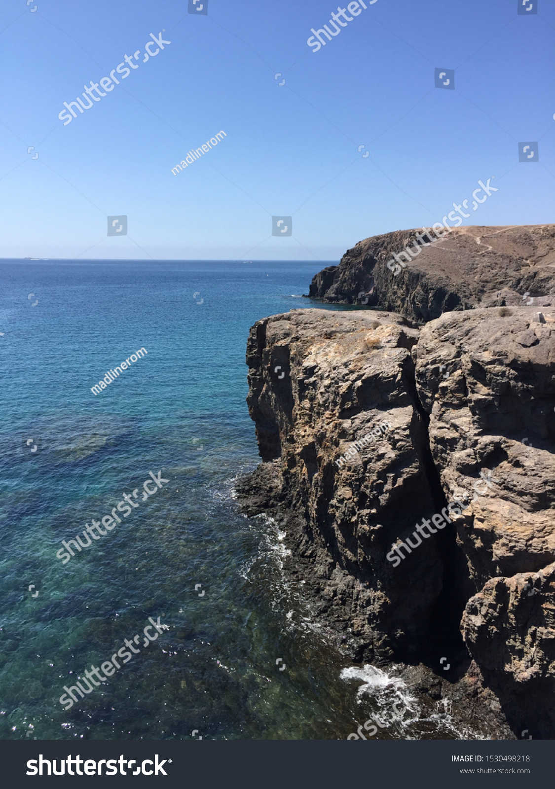 beautifulcliffontheseawithclearbluewateronthecanaryislands