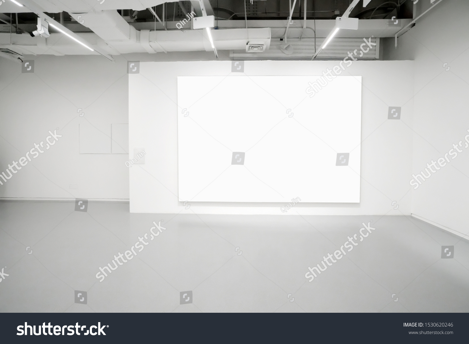 Empty Gallery interior space  white walls and grey floors