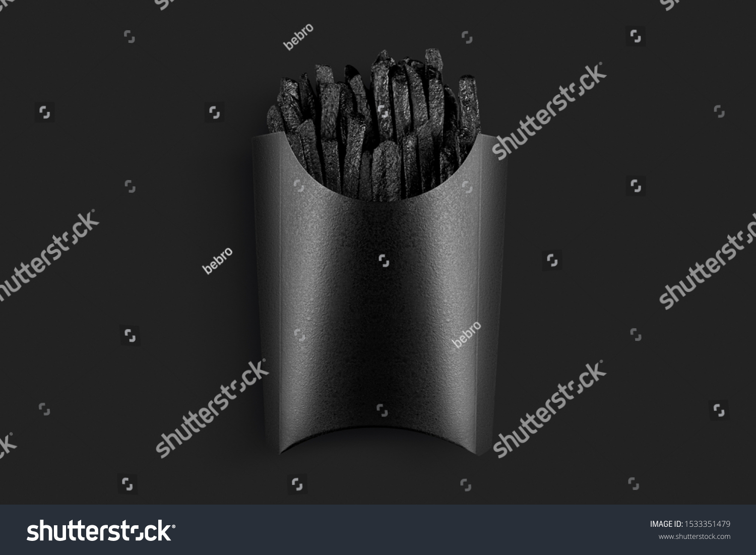 Painted in black french fries with packing black. Painted food concept poster on black. Black friday sale. surrealism of food