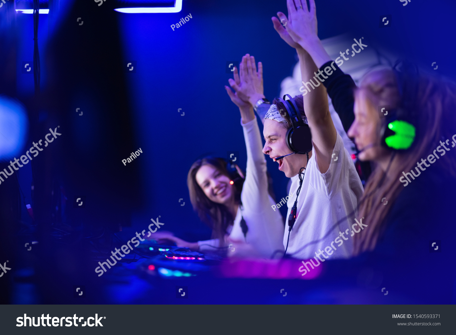 Team professional gamer playing winning tournaments online games computer.