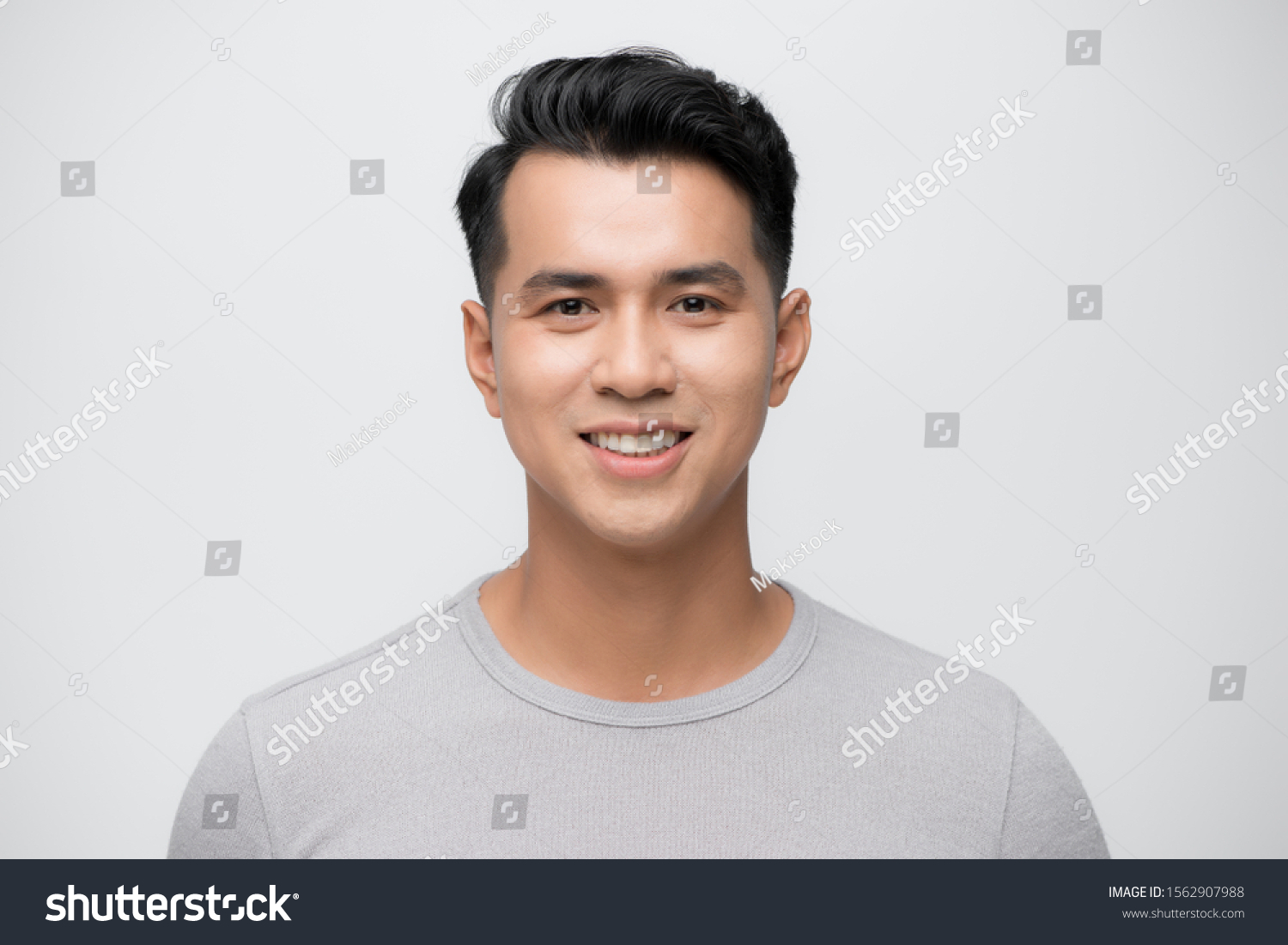 Young Asian man close up shot isolated on white