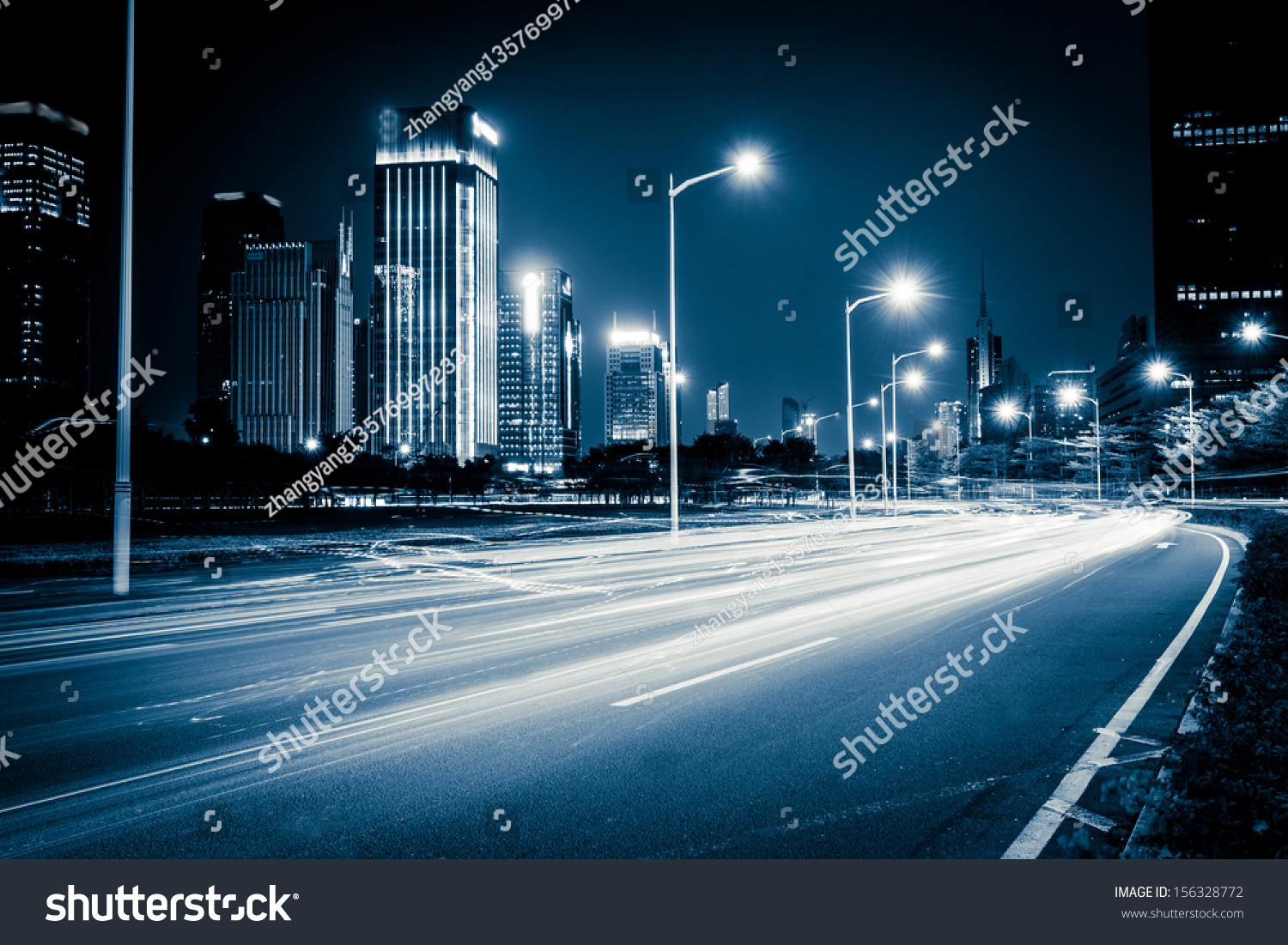 light trails on the modern city street at night