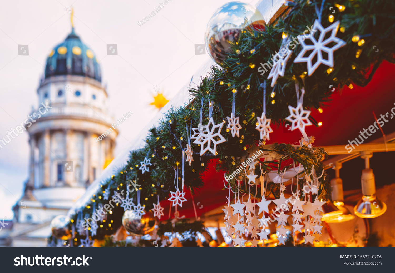 Evening Christmas market on Gendarmenmarkt in Berlin in Germany Europe winter. German Night street Xmas and holiday fair in European city. Advent Decoration and Stalls with Crafts Item on Bazaar