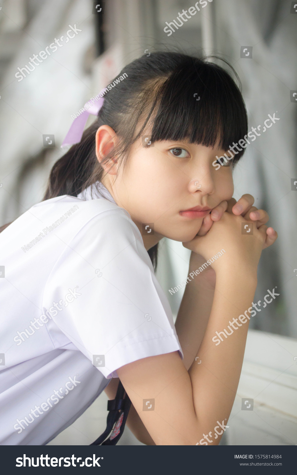 thai Junior high school student uniform teen beautiful girl happy and relax