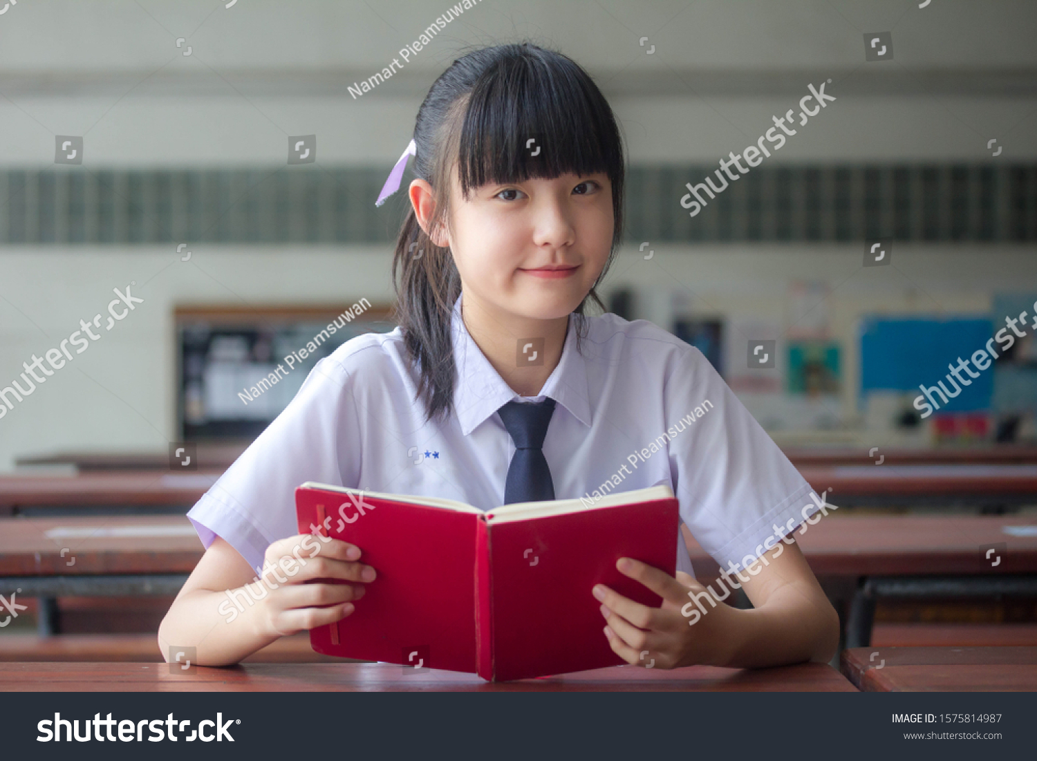 thai Junior high school student uniform teen beautiful girl happy and relax