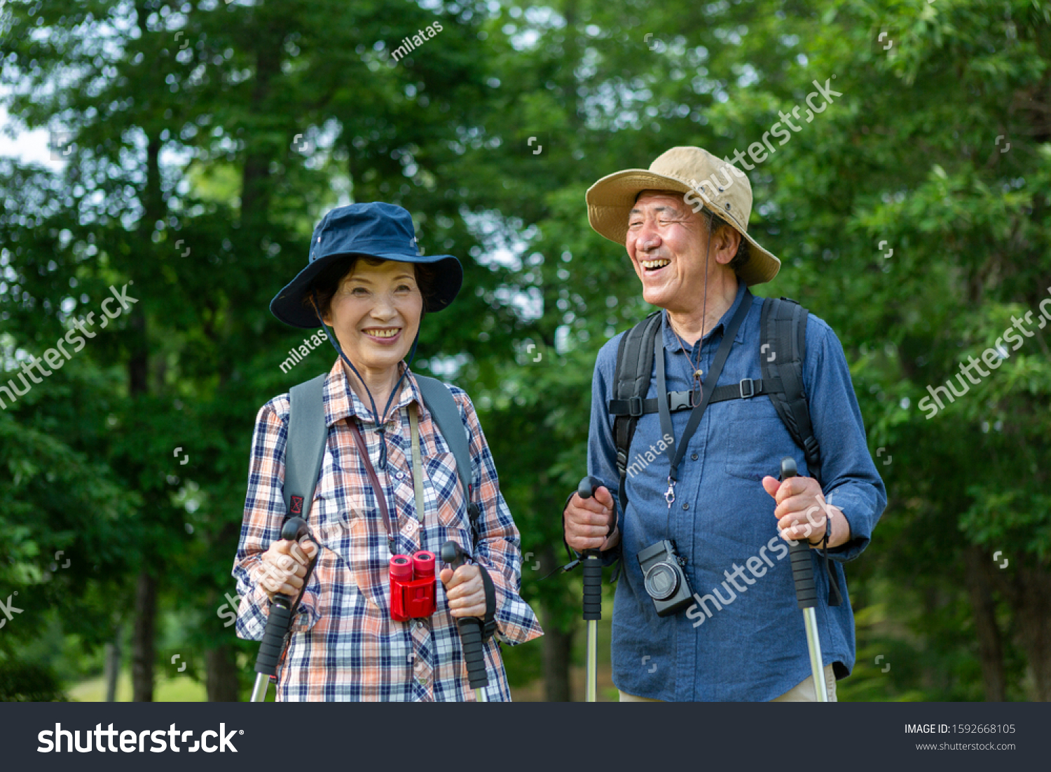 Senior couple walking in the mountains