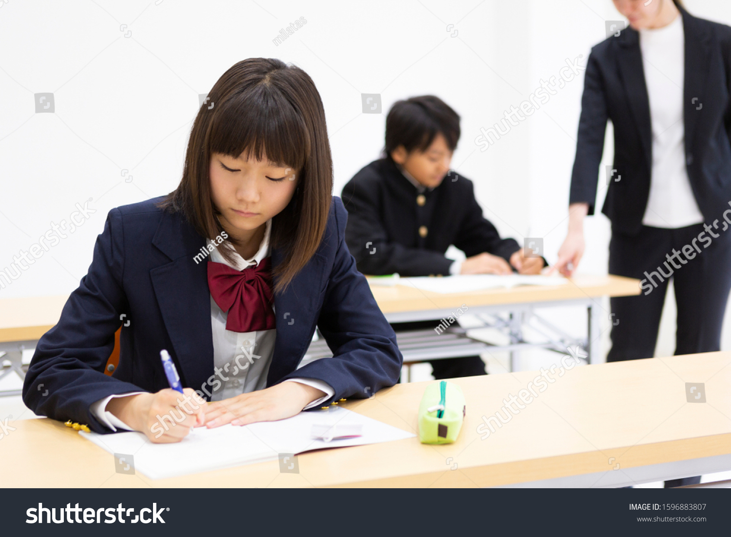 Junior high school students studying at a cram school