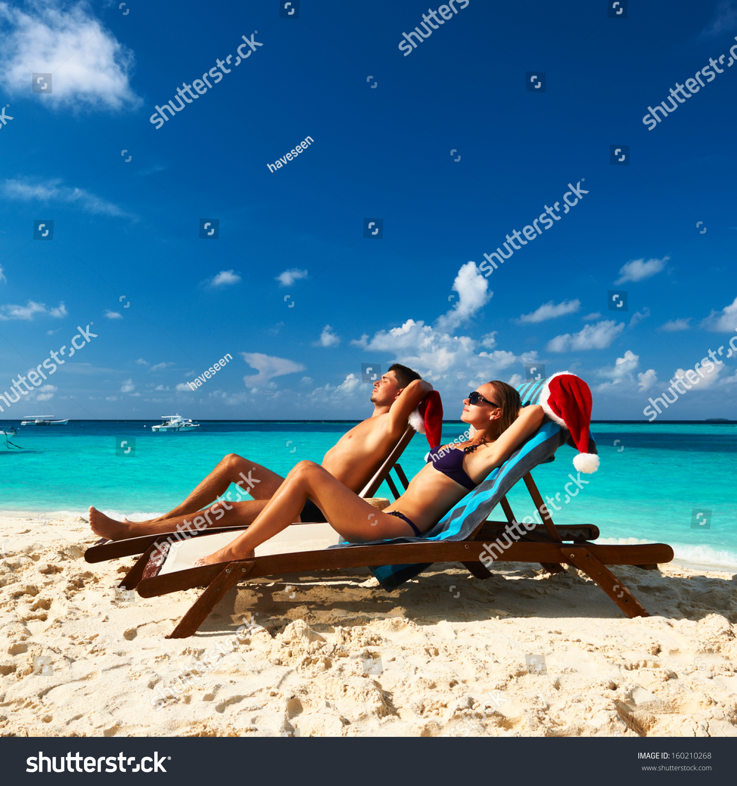Couple on a tropical beach at Maldives