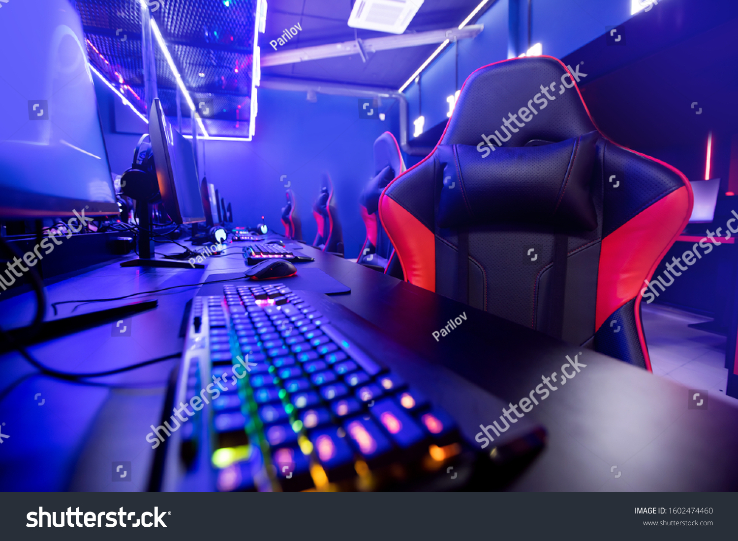 Professional gamers cafe room with powerful personal computer game chair blue color. Concept cyber sport arena.