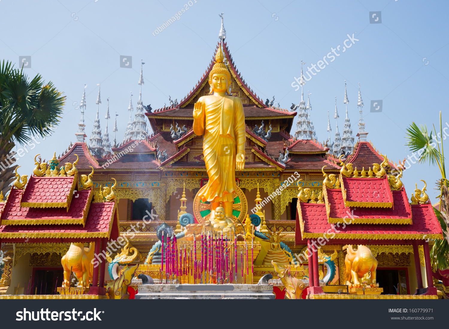 figure of Buddha and Buddhist palace in Xishuangbanna China