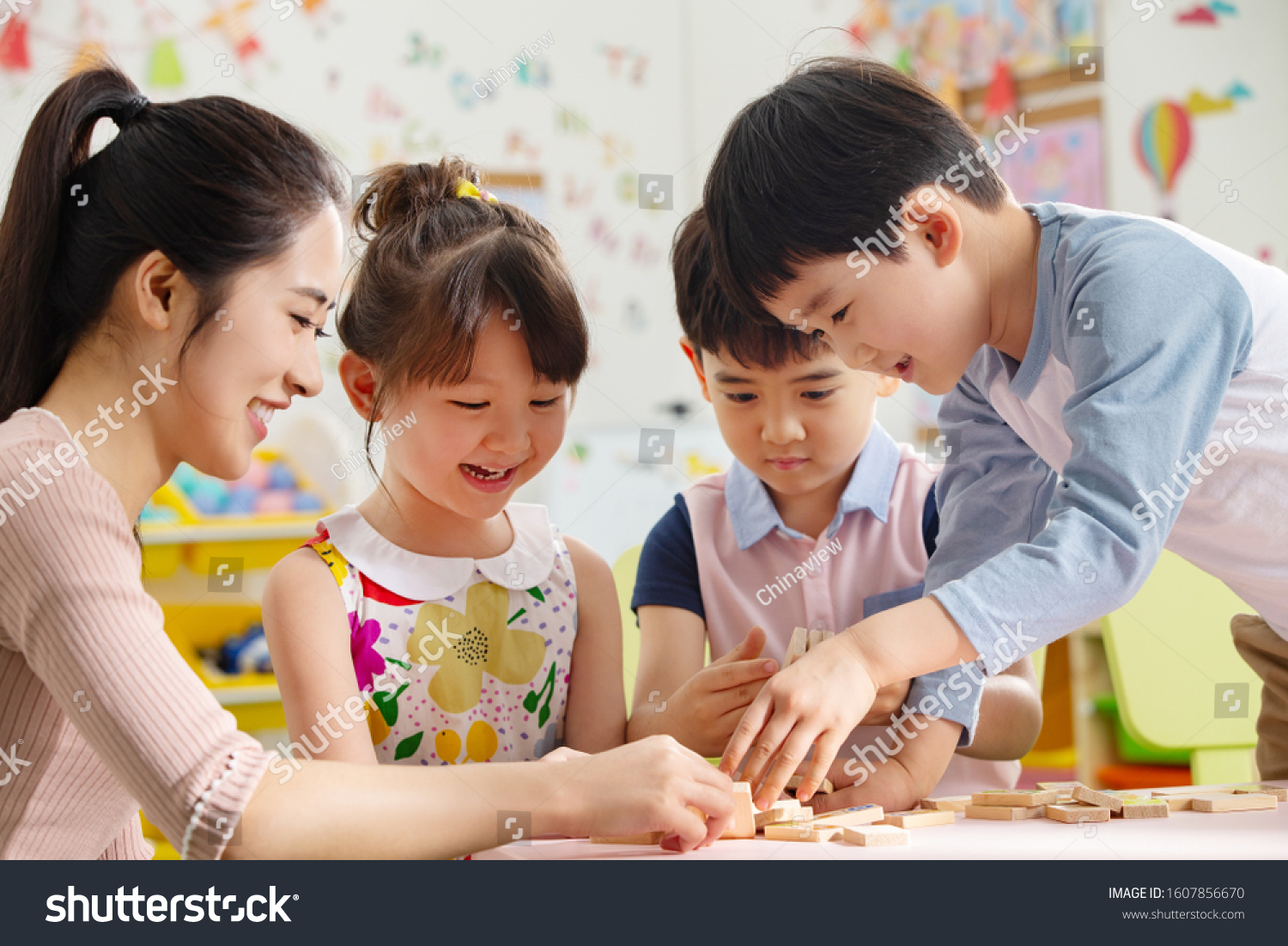 Kindergarten teachers and the children