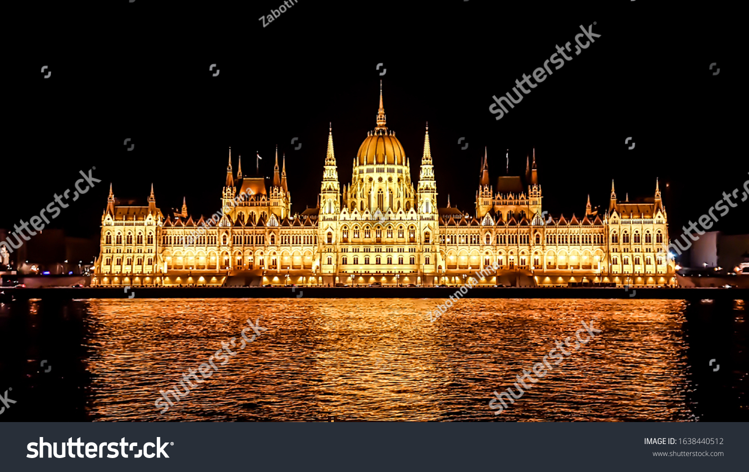 Budapest Parliament in Hungary at night. View form the Danube river.