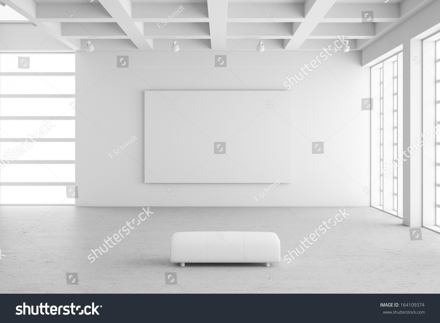 Empty exhibition hall with empty frame and concrete floor