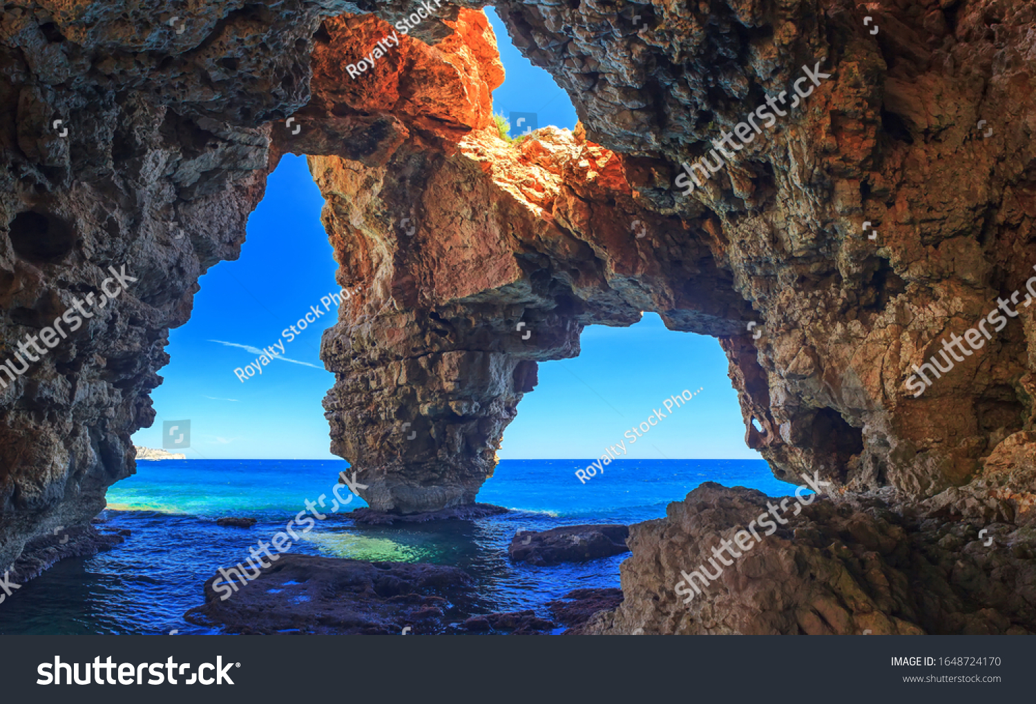 Caves by the sea in a beautiful place  rocks in the sea Cala del Moraig