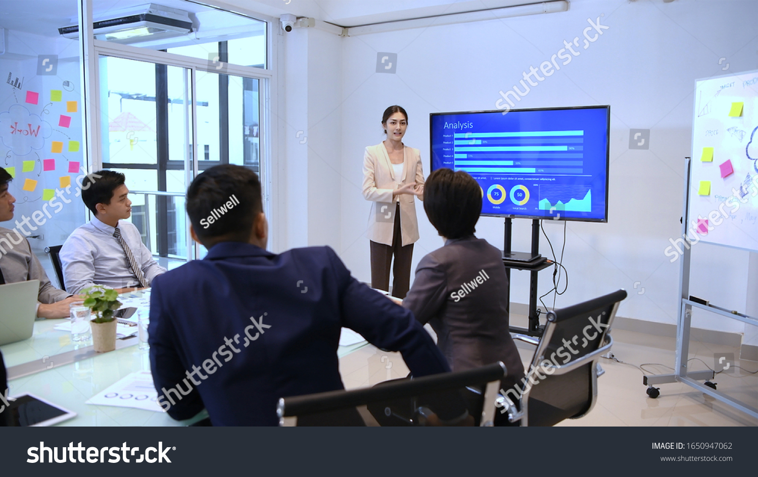 Business concepts. Businessmen are presenting sales at the meeting.