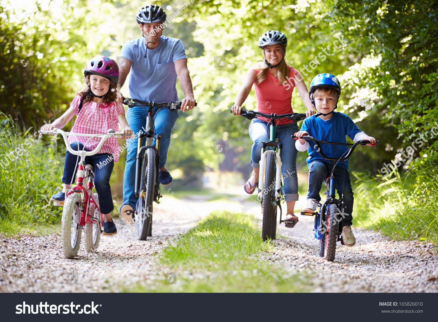 Family On Cycle Ride In Countryside