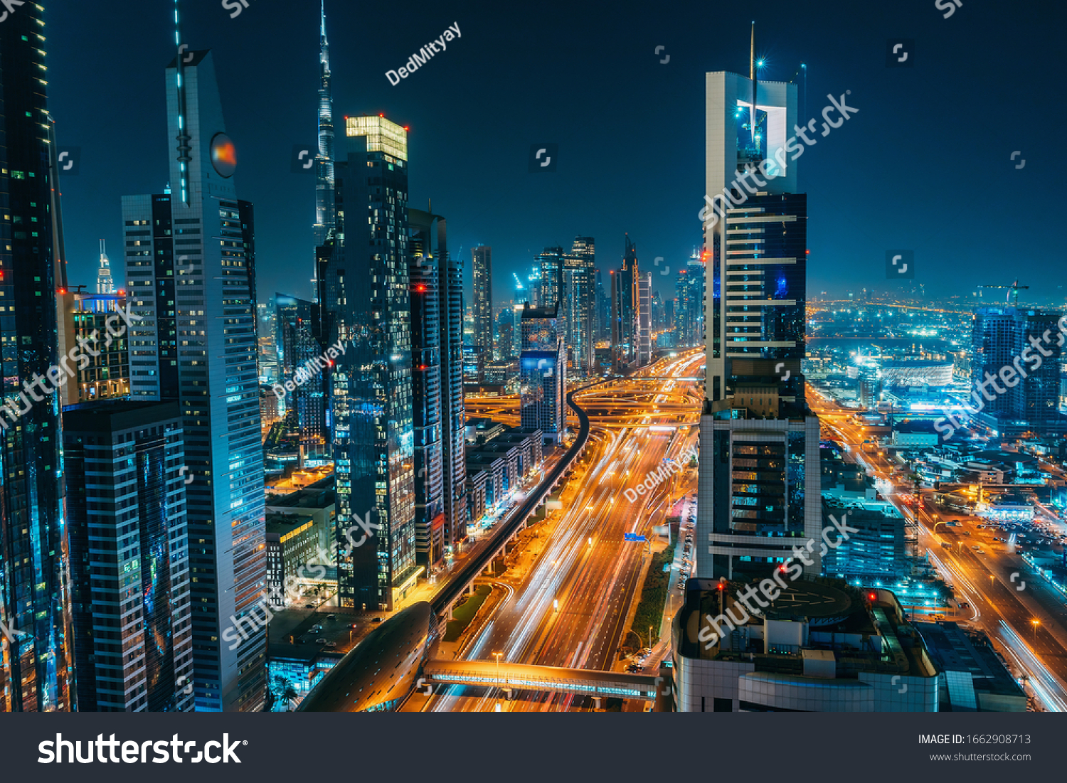 Panorama of Dubai downtown at night from above  United Arab Emirates.