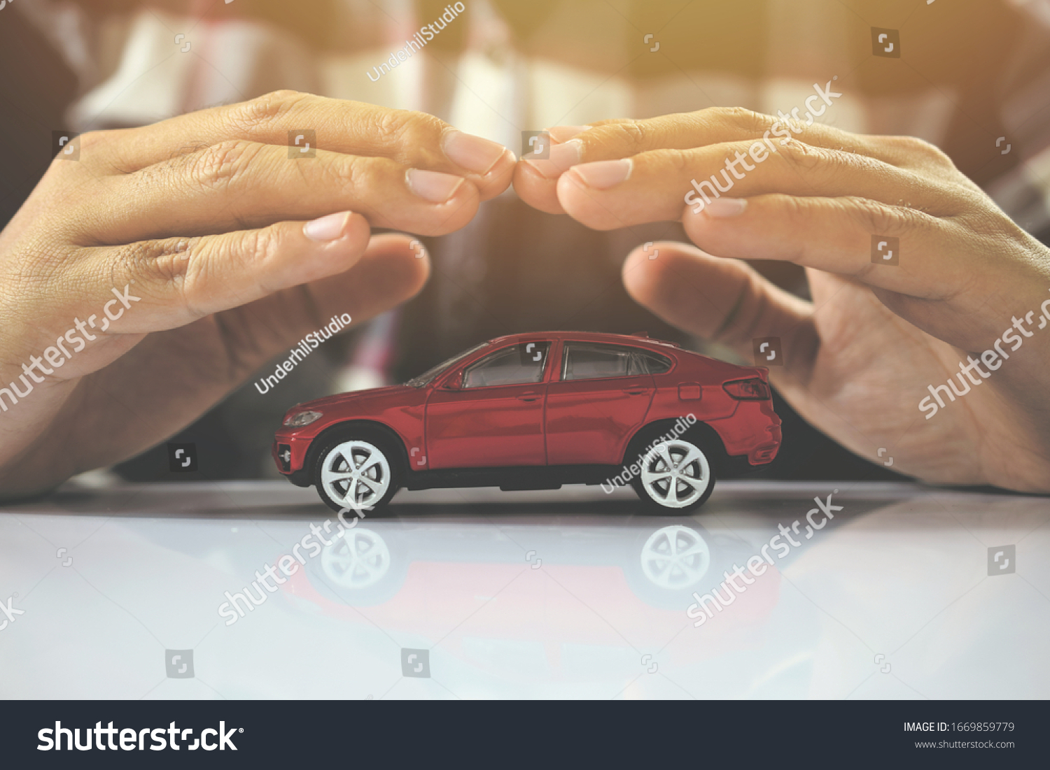 Male hands and car as protection of car concept
