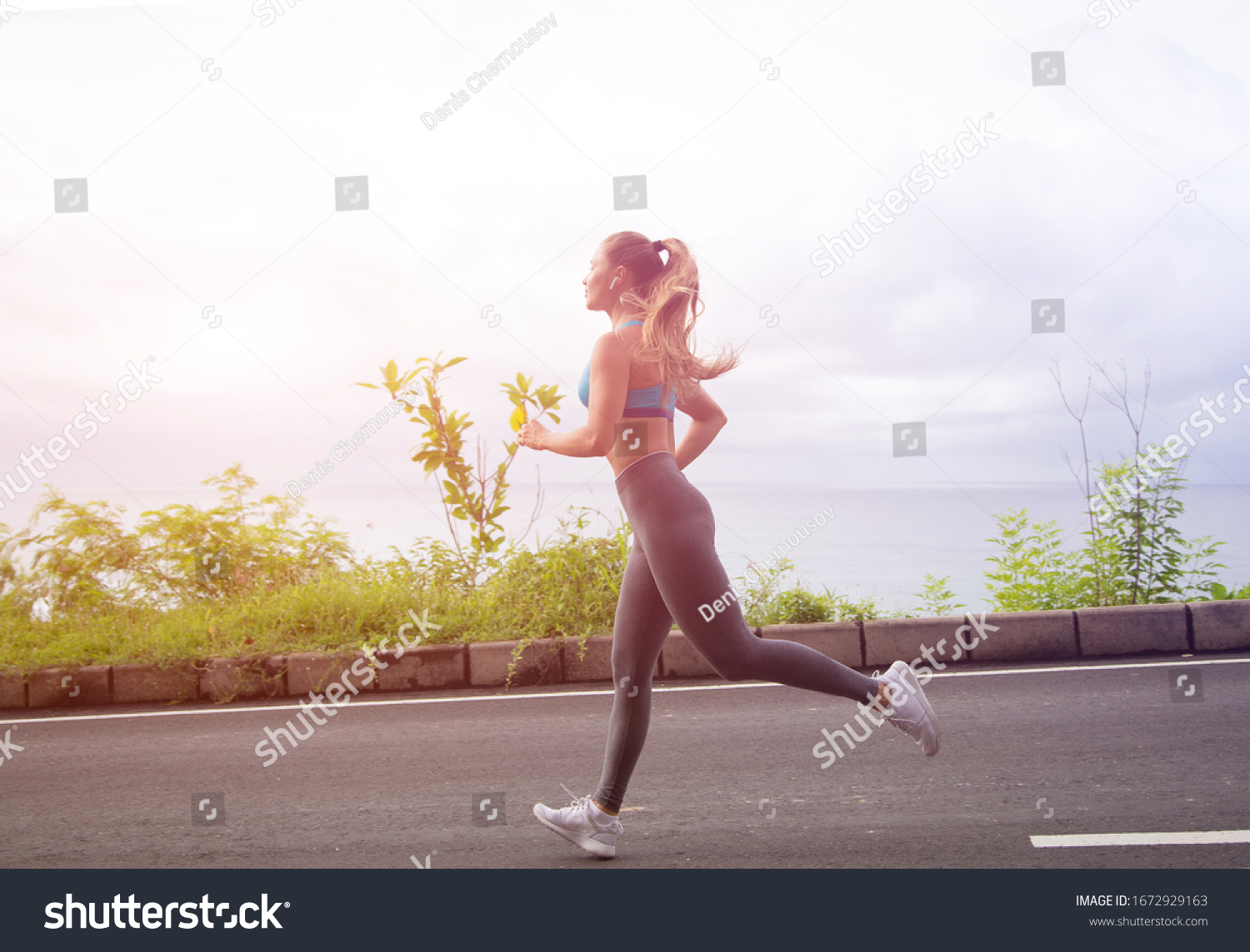 Young fitness woman runner running on sunrise road_站酷海洛_正版图片_视频_字体_音乐素材 ...