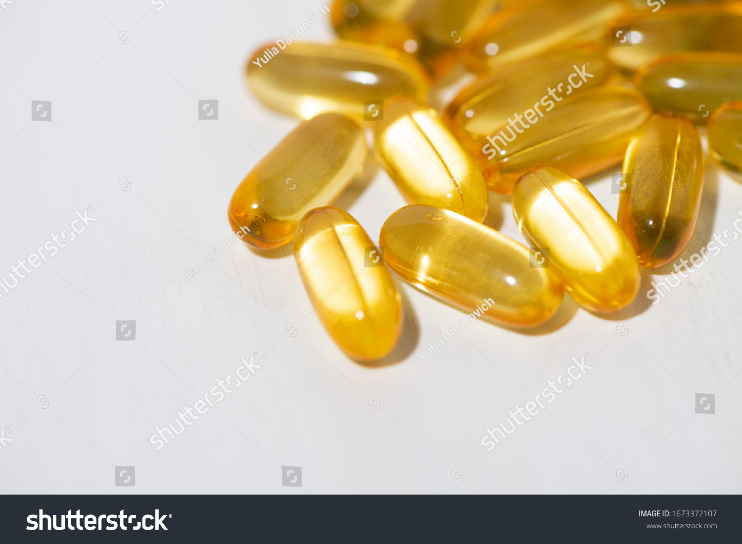dietary supplement - fish oil capsules  top view closeup